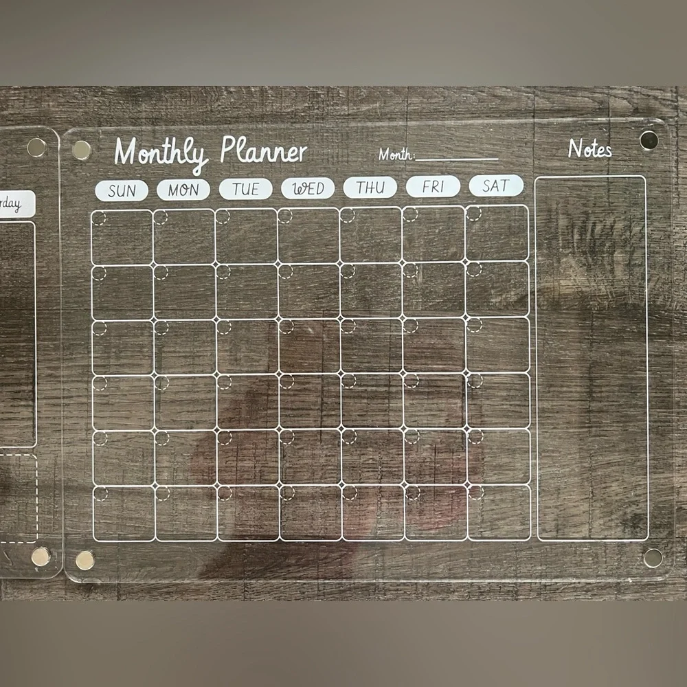 Monthly and weekly dry erase/magnetic/acrylic calendars. Each one is 12x16in.